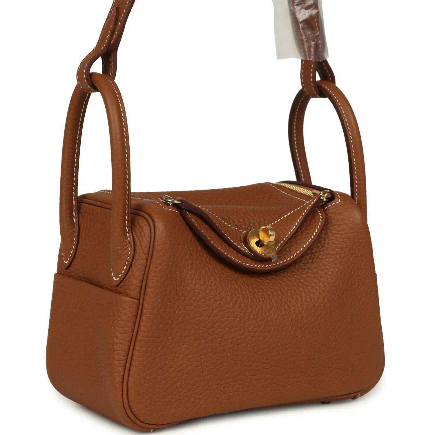 Mini Lindy bag in tan textured leather with gold-tone clasp and double top handles