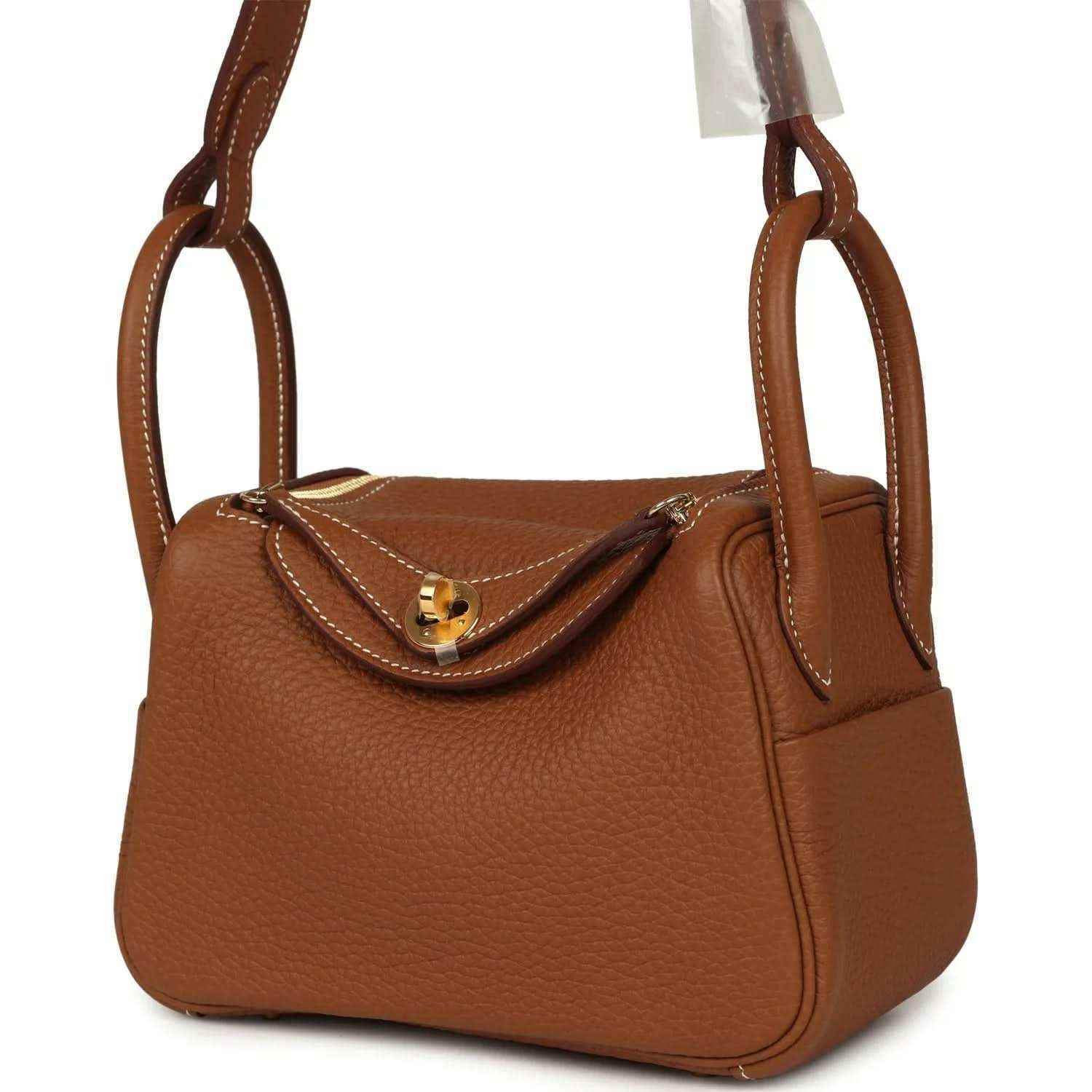 Mini Lindy bag in tan textured leather with gold-tone clasp and side detail