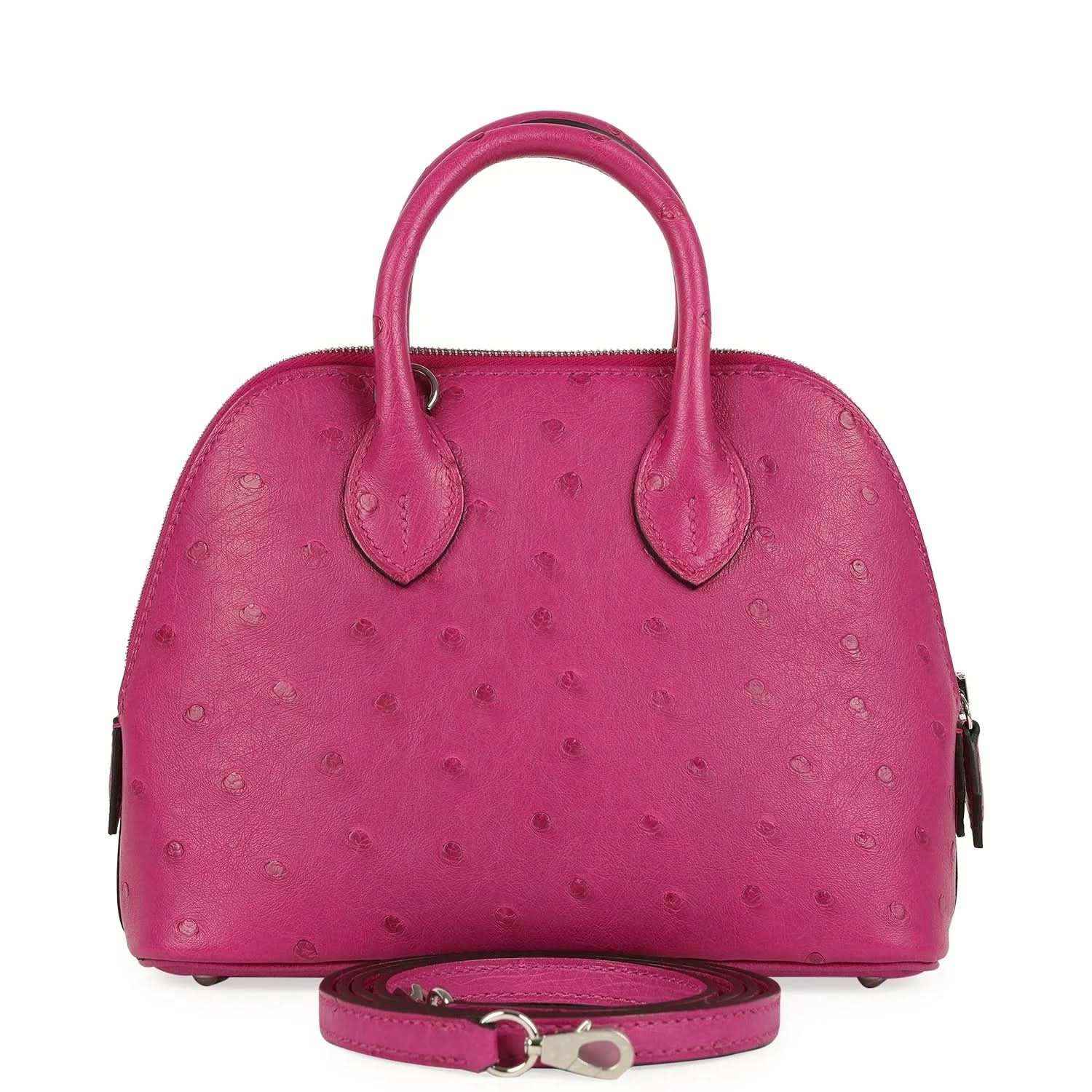Mini Bolide bag in rose purple ostrich leather with top handles and crossbody strap.
