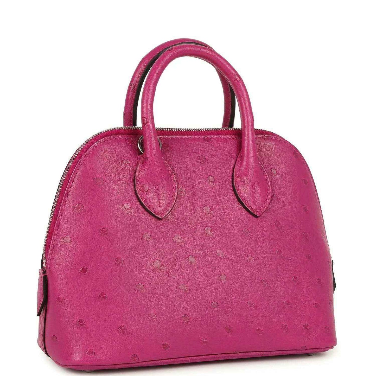 Mini Bolide bag in rose purple ostrich leather with top handles and zip opening.