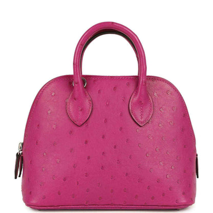 Mini Bolide bag front view in rose purple ostrich leather with twin handles and zip.