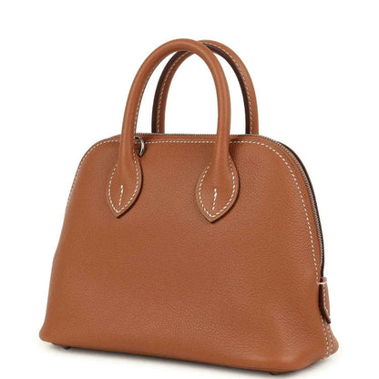 Mini Bolide handbag in cognac leather with double handles and side pull detail