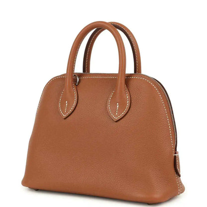 Mini Bolide handbag in cognac leather with double handles and side pull detail