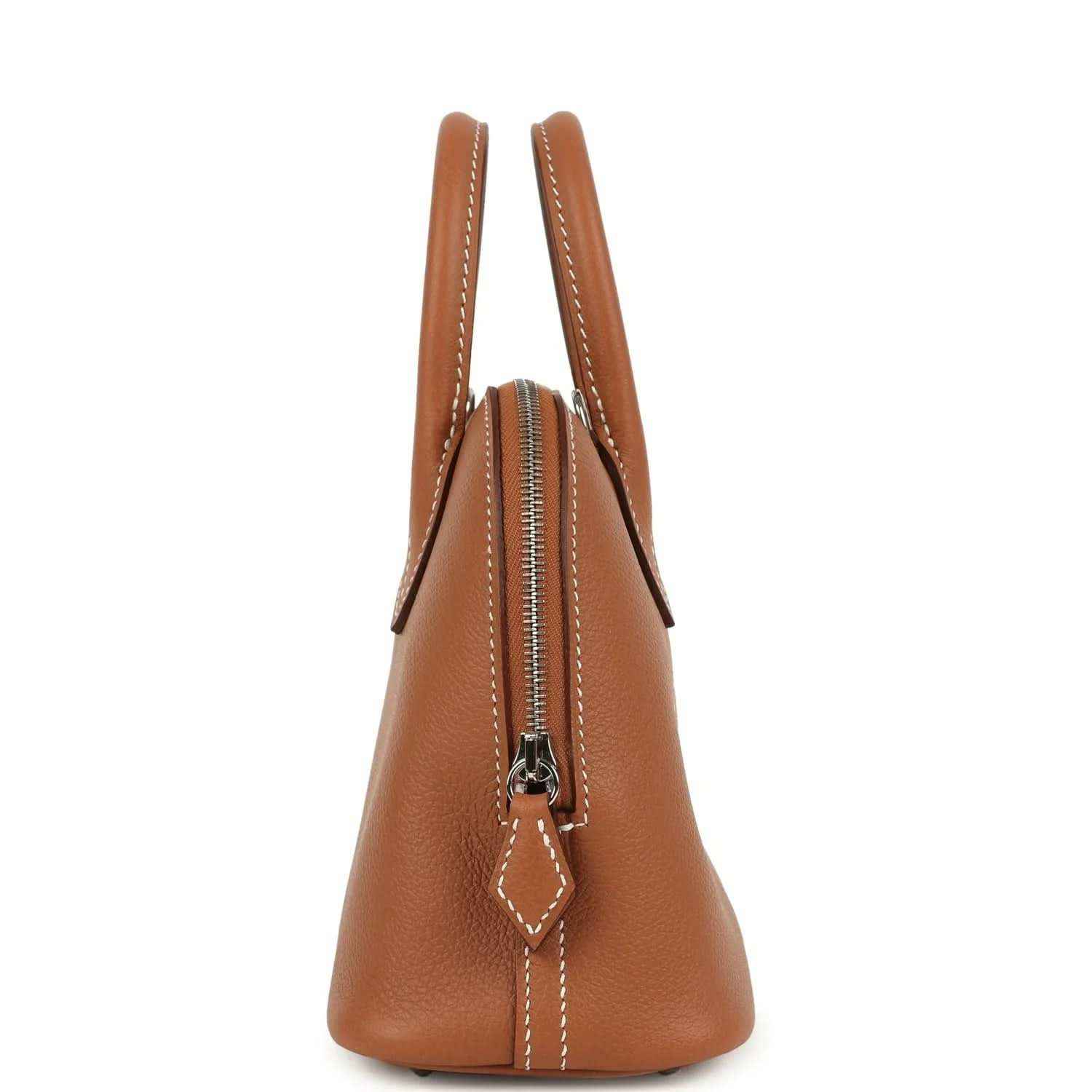 Mini Bolide handbag in cognac leather, side view with small zipper pull and tab