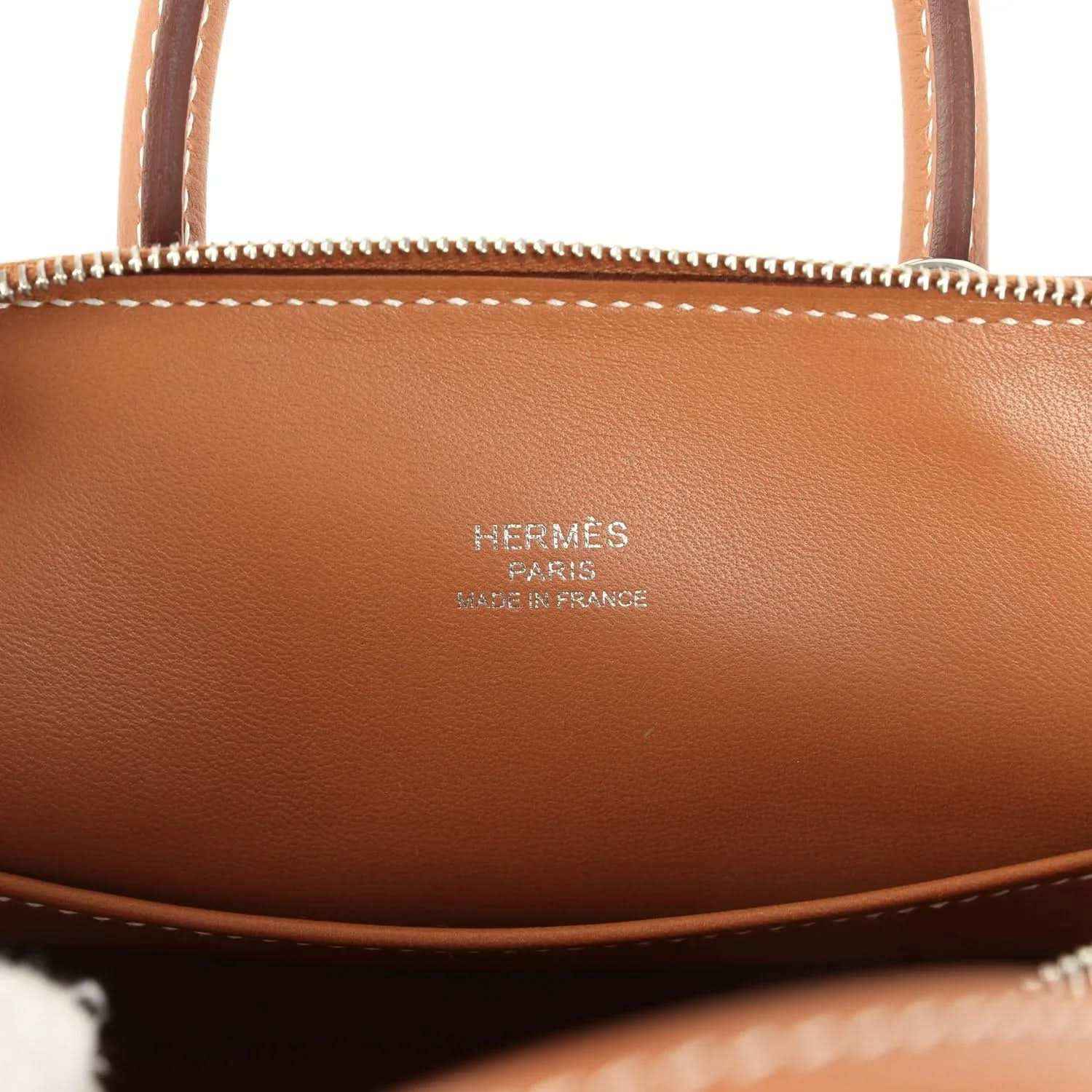 Hermes Paris Made in France stamp on cognac leather under zipper trim