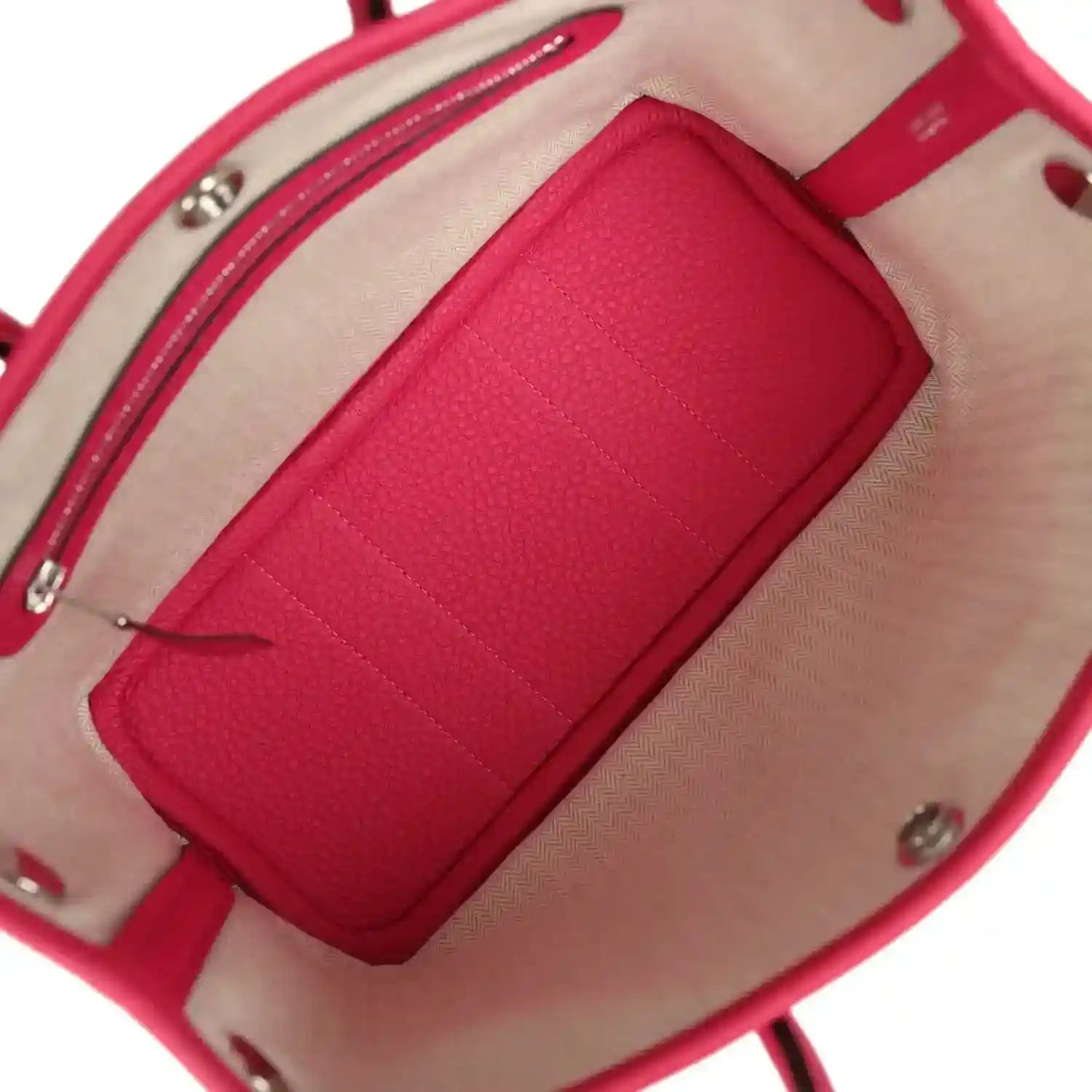 Rose pink leather tote bag interior with zip pocket and beige lining