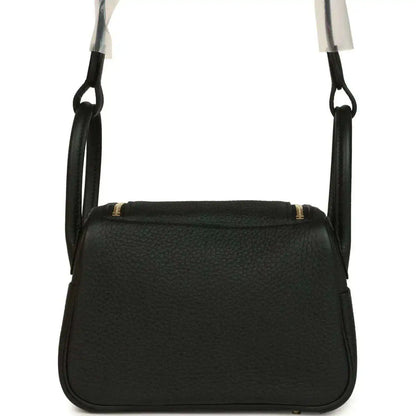 Hermes Mini Lindy II mini bag in black textured leather with front flap and loop handles