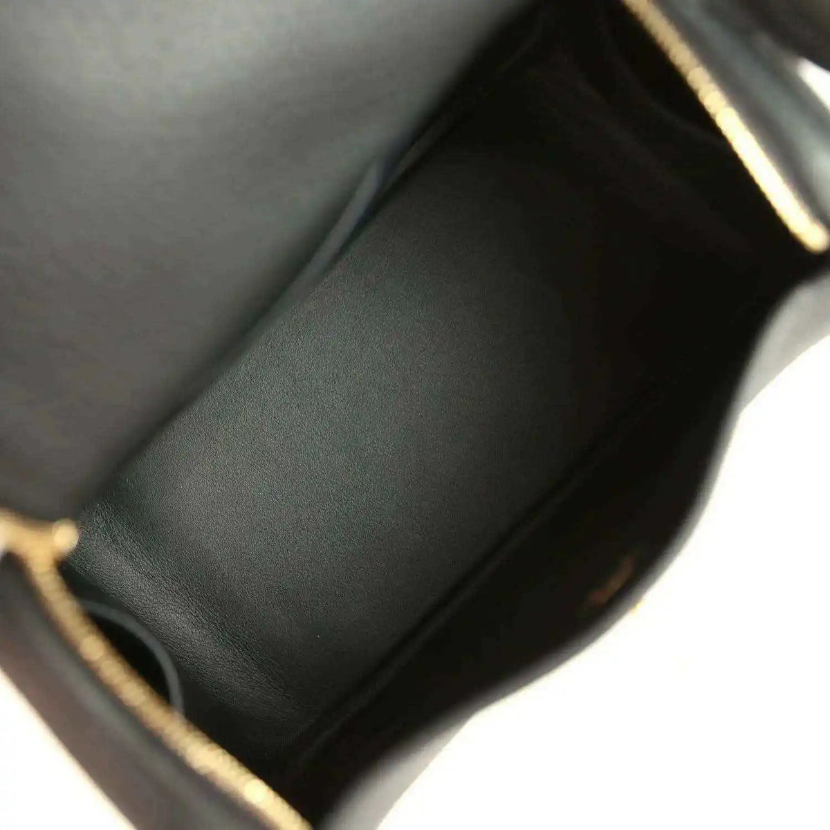 Hermes Mini Lindy II bag interior in black leather lining with gold-trimmed edge