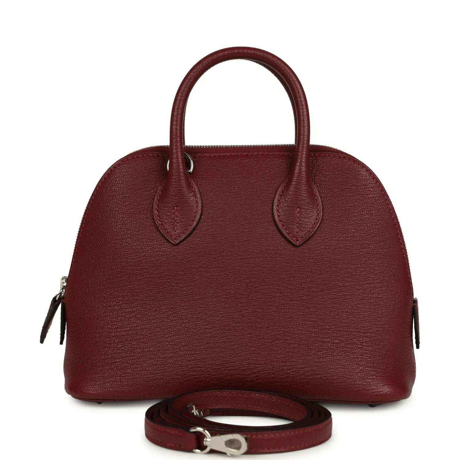 Mini leather handbag in deep red with top handles and detachable strap