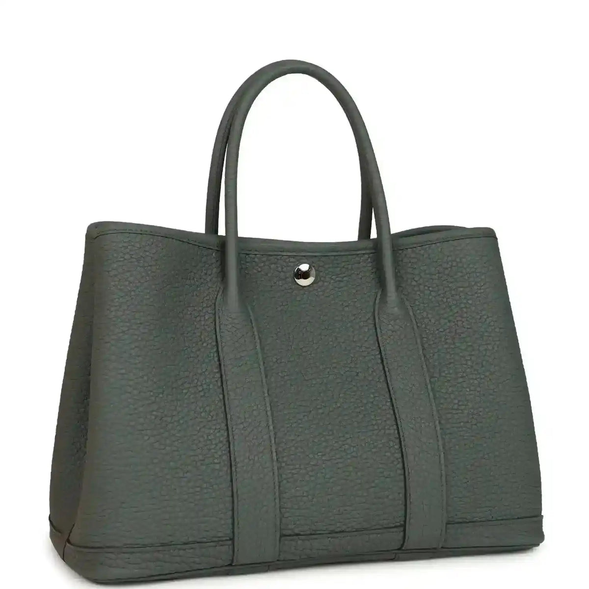 Leather tote bag with top handles and snap front tab, textured dark green exterior