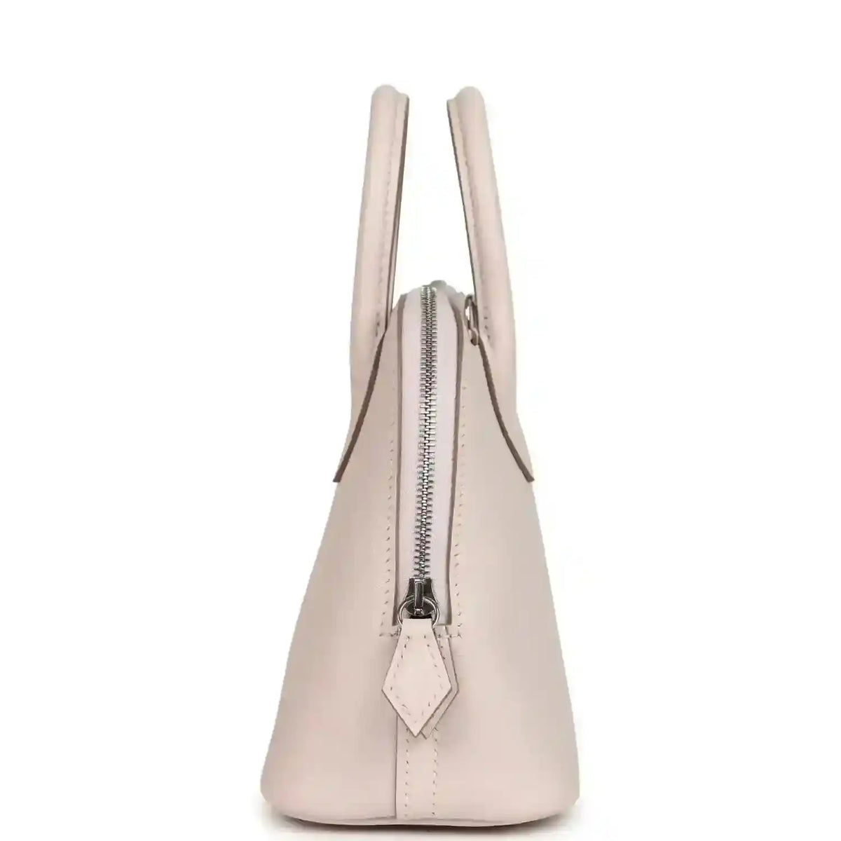 Mauve mini handbag side view with vertical zipper and leather pull tab