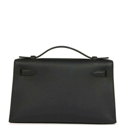 Hermes Kelly pochette handbag back view in black leather with flap lock