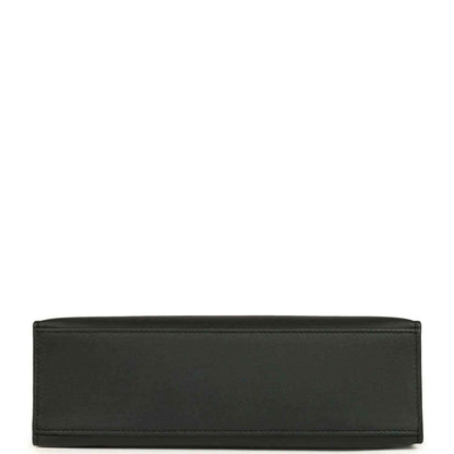 Hermes Kelly pochette handbag back panel in black leather with stitched edges