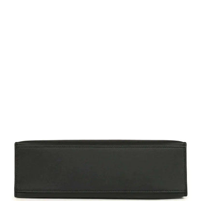 Hermes Kelly pochette handbag back panel in black leather with stitched edges