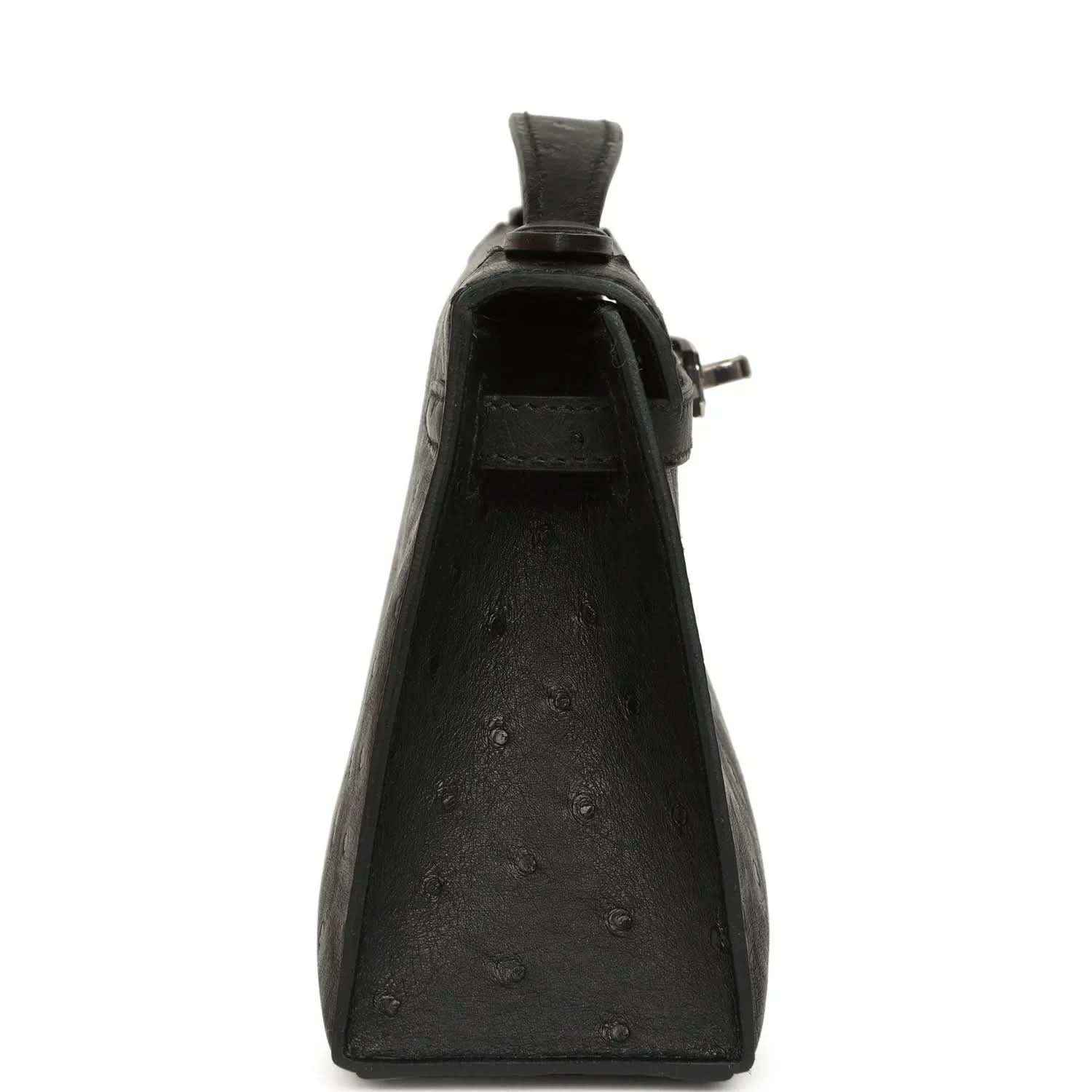 Black ostrich leather clutch, back view with side loop handle and hardware