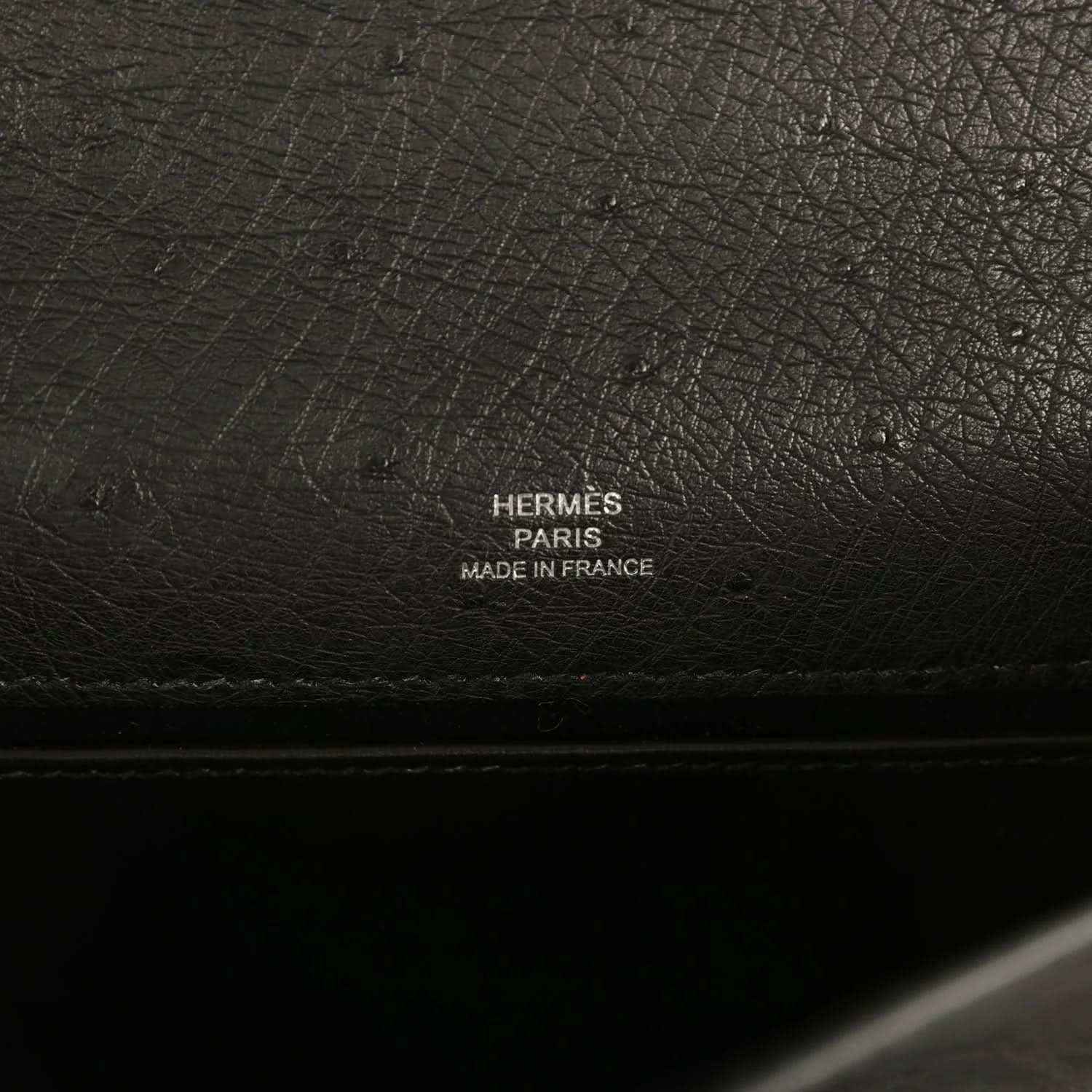 Hermes Paris made in France stamp on black leather clutch