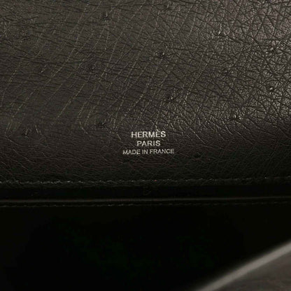 Hermes Paris made in France stamp on black leather clutch