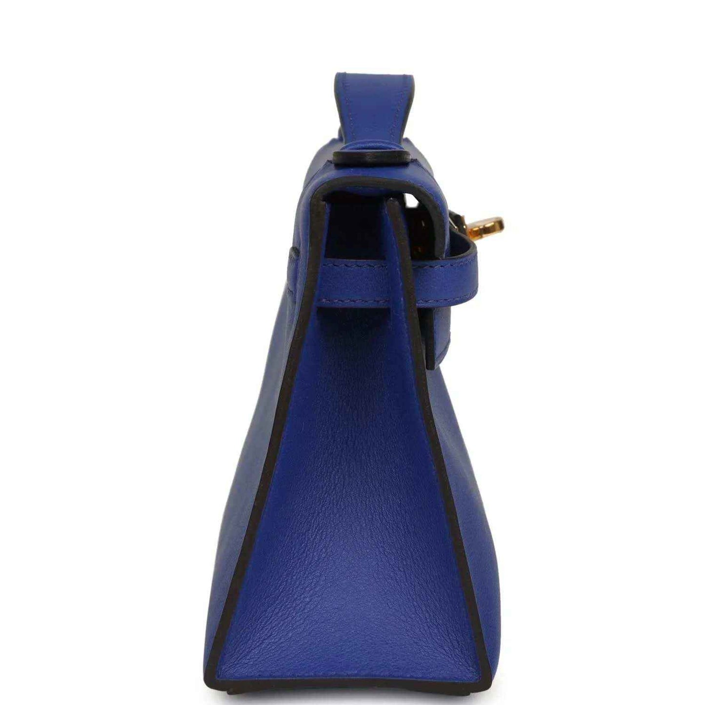 Electric blue leather pochette with side strap and gold hardware near top opening