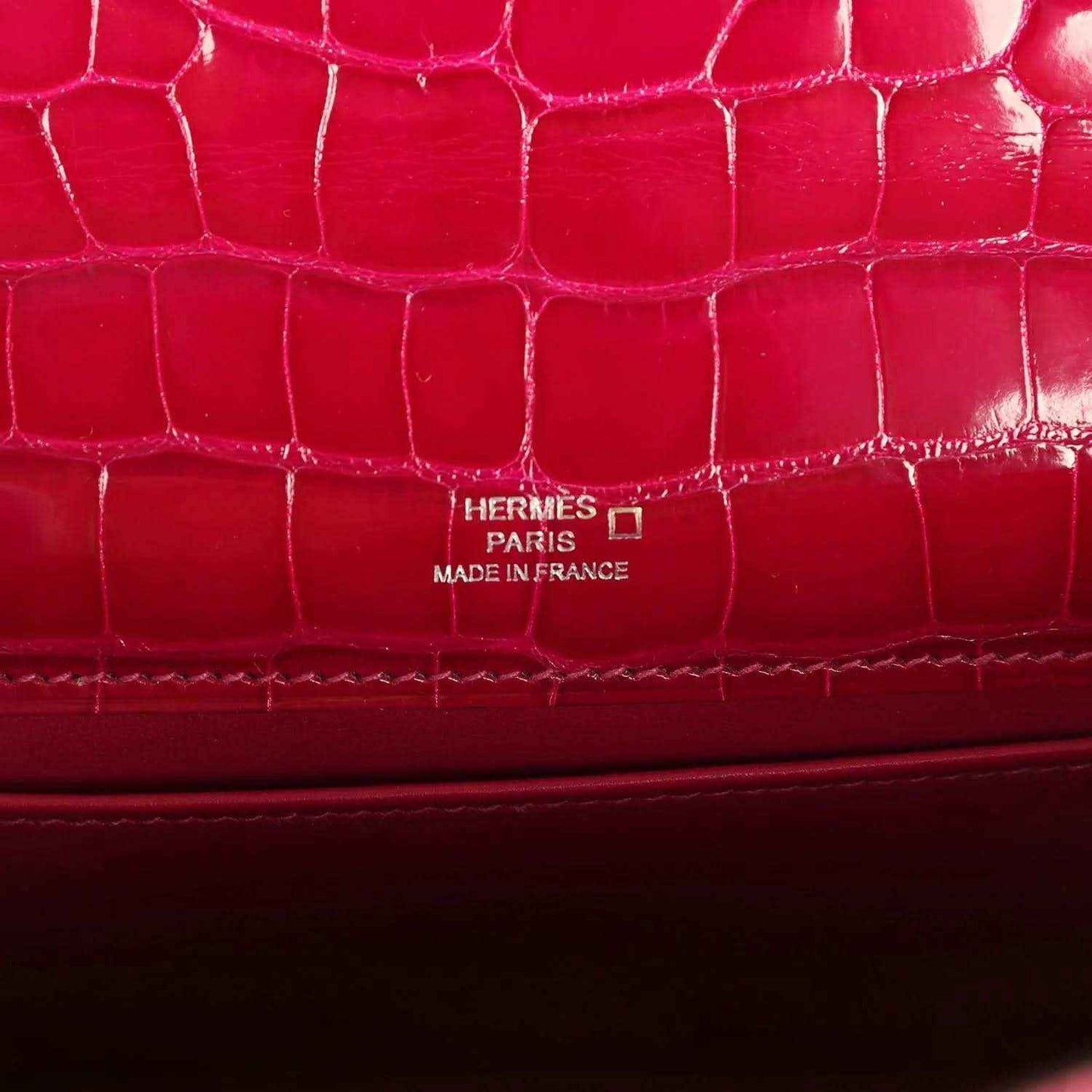 Hermes Paris made in France stamp on magenta crocodile-effect leather bag