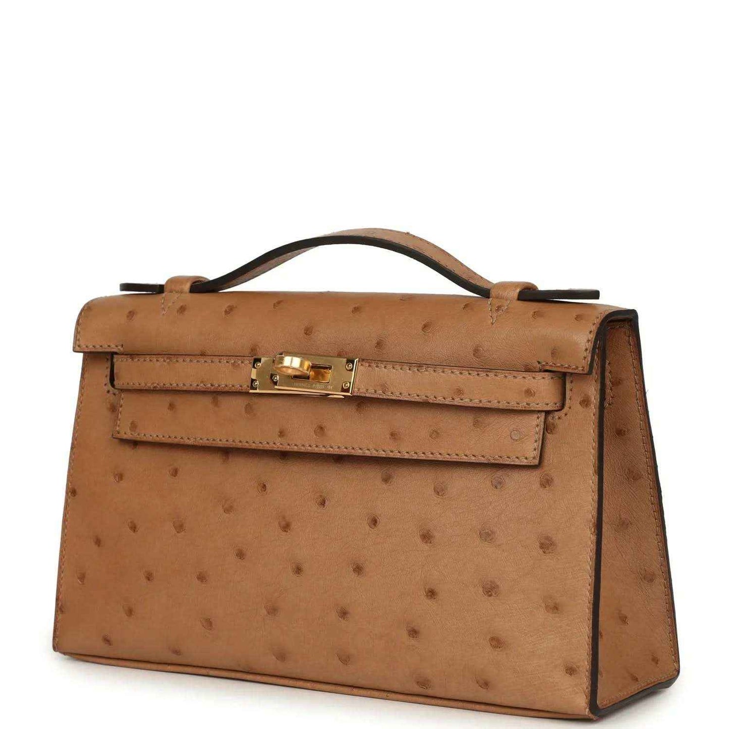 Tan textured leather clutch with gold front clasp and top handle