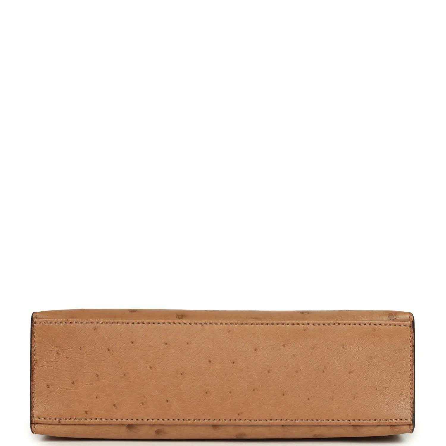 Tan leather clutch back panel with stitched border and smooth surface