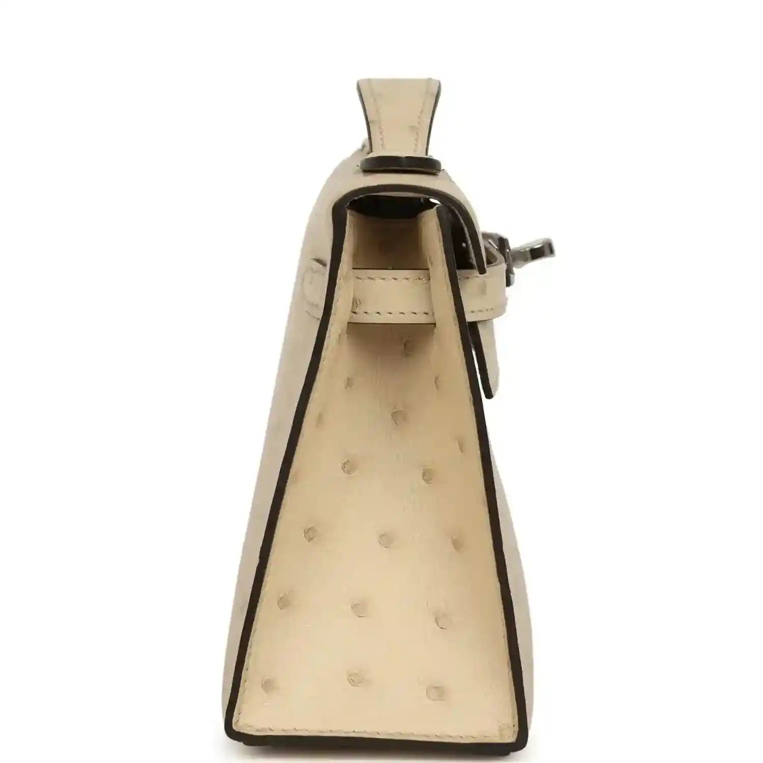 Beige ostrich-leather clutch opened, showing interior with top clasp