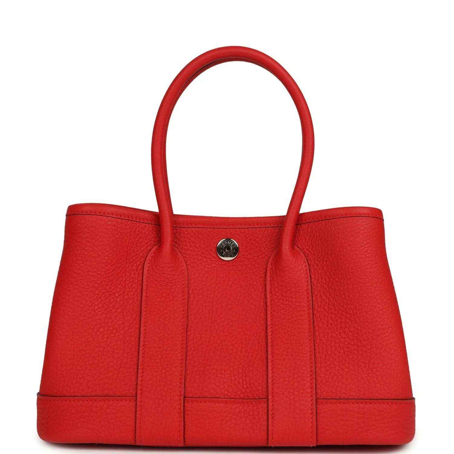 Red togo leather tote bag front view with top handles and metal snap closure