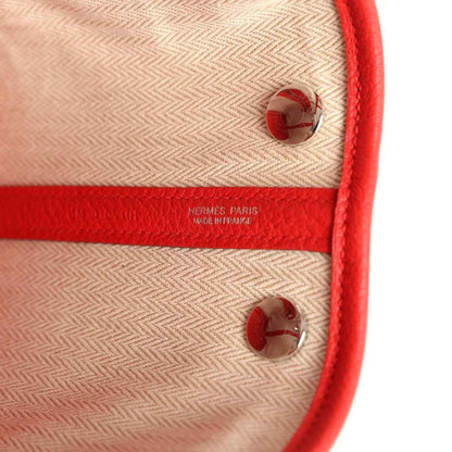Hermes Paris leather tote lining with snap buttons and embossed "Made in France"