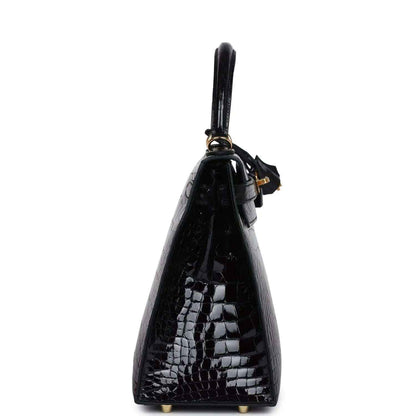 Black alligator leather Kelly handbag with gold-tone top ring and strap