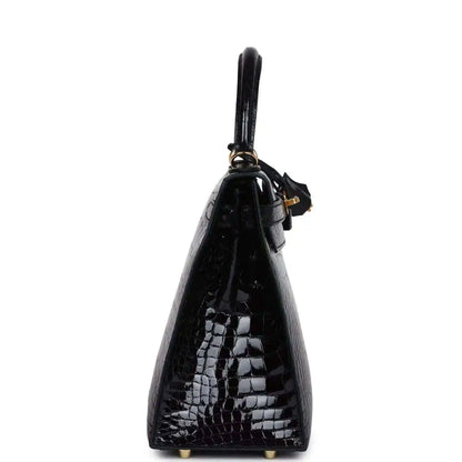 Black alligator leather Kelly handbag with gold-tone top ring and strap