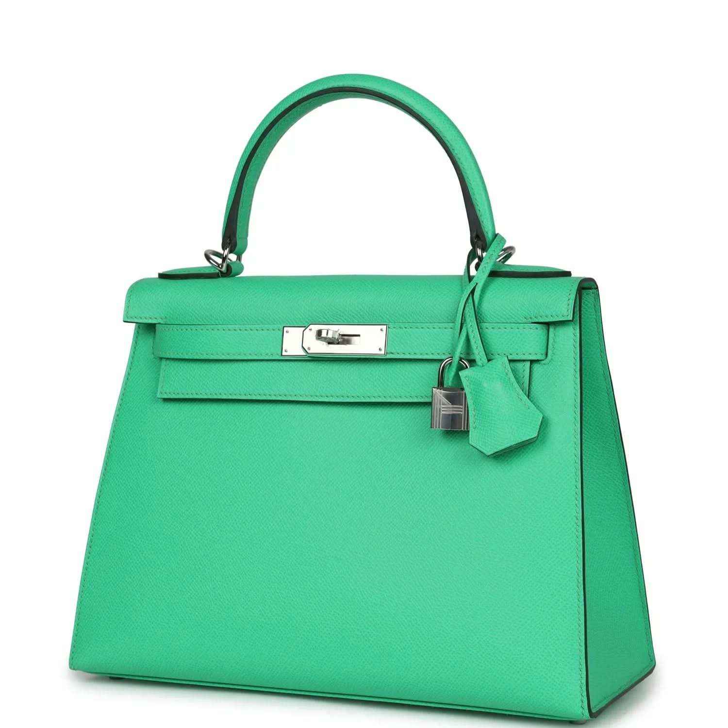 Green leather top-handle handbag with silver nameplate, front clasp, and charm