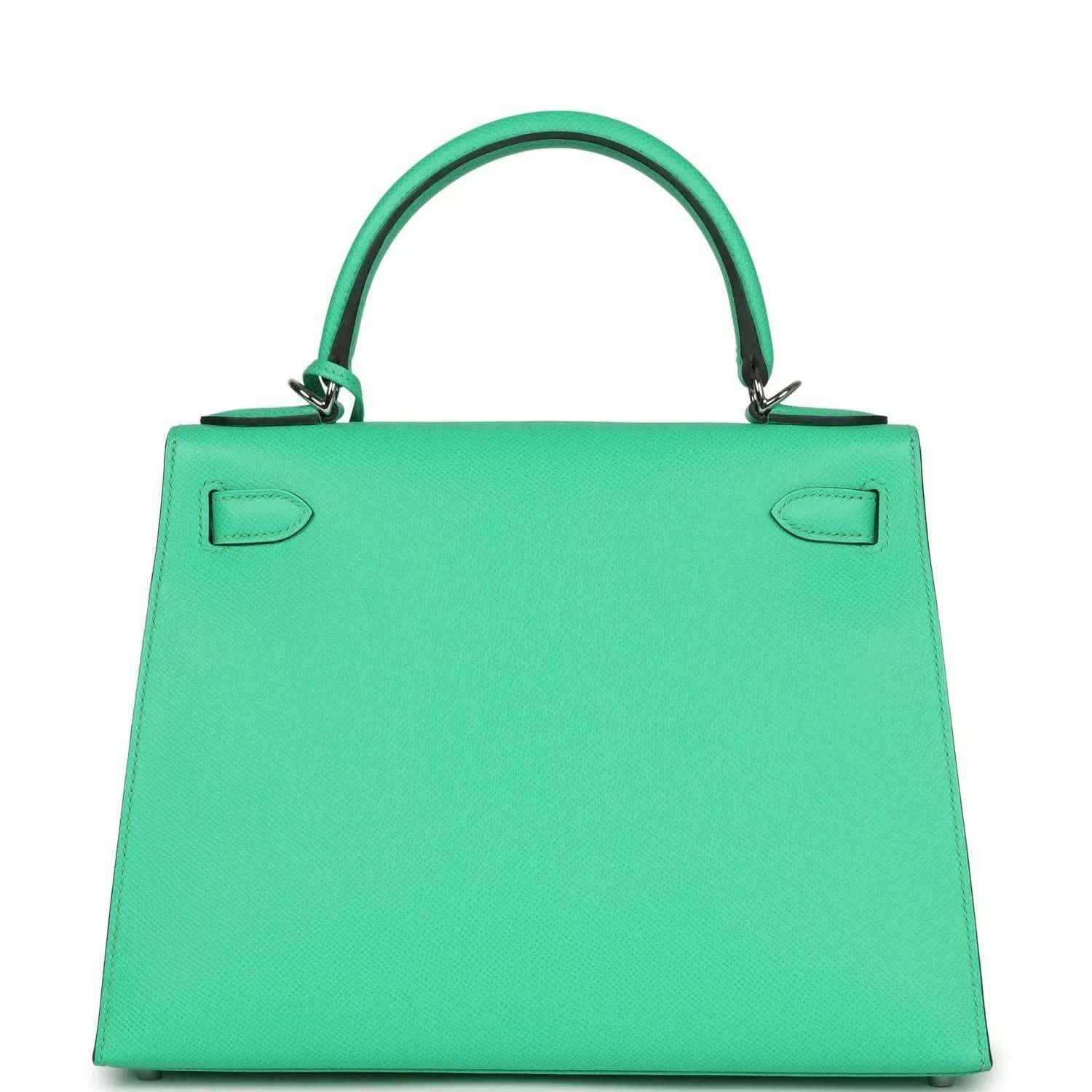 Green leather top-handle handbag with fold-over flap and two top corner tabs