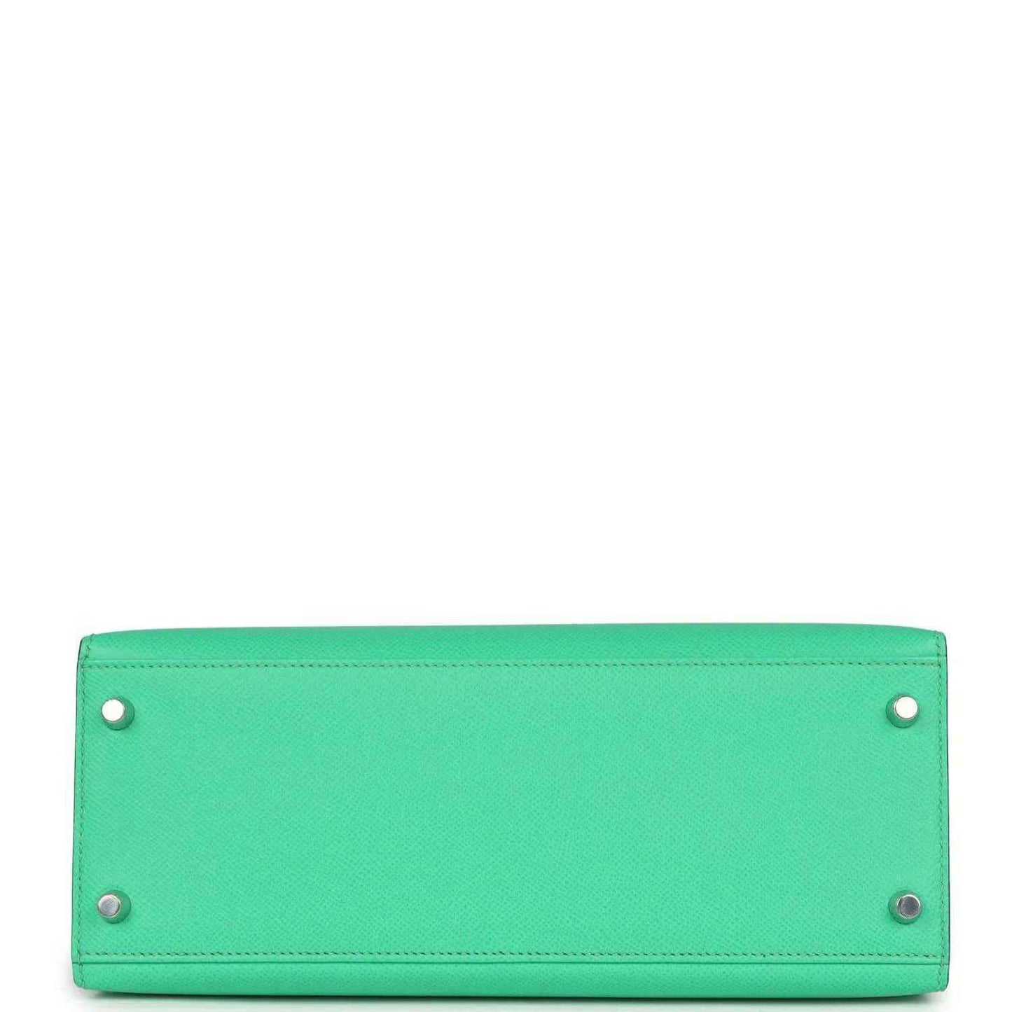 Green leather rectangular bag base with four corner rivets and side eyelets