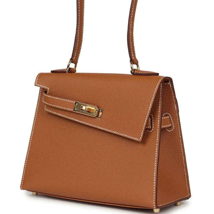 Hermes Kelly handbag tan textured leather, angled front view with turn-lock clasp