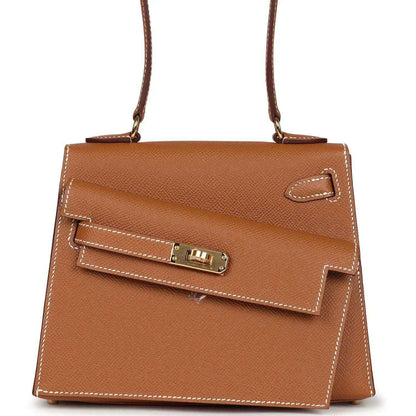 Hermes Kelly handbag in tan textured leather with gold-tone turn-lock on front flap