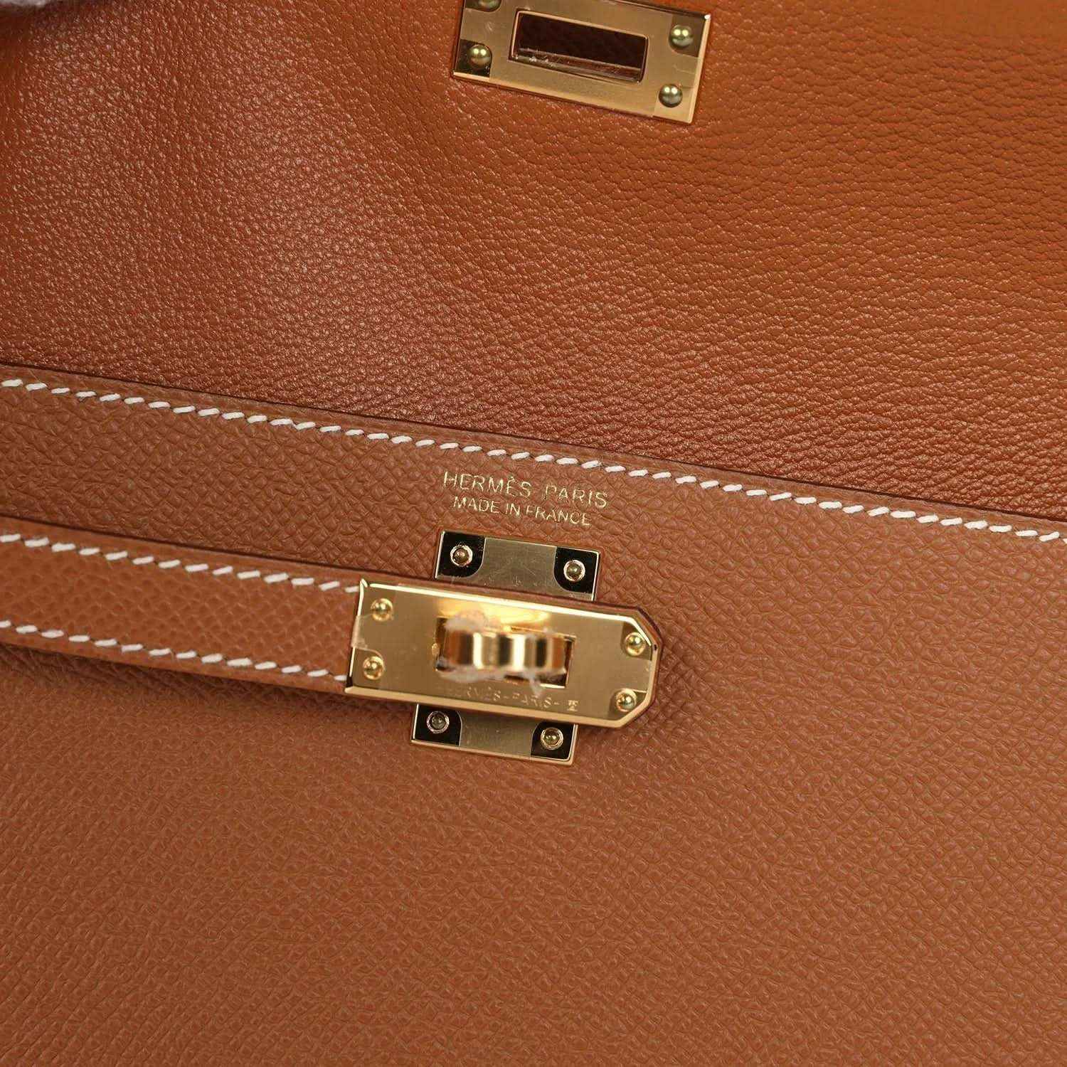 Hermes Kelly handbag clasp close-up with Hermes Paris made in France hardware