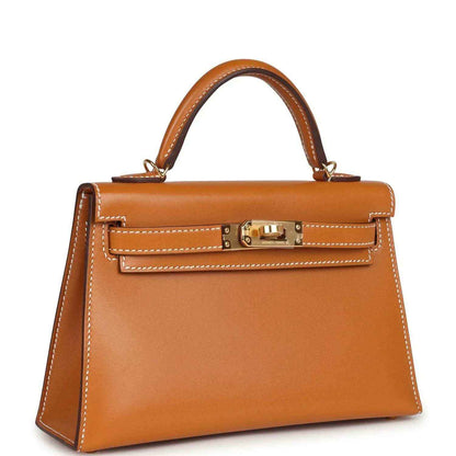 Kelly Sellier 20 handbag tan leather with gold turn-lock and top handles, front view