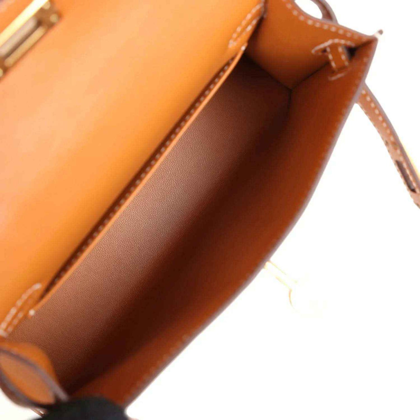 Kelly Sellier 20 handbag interior with tan lining and stitched edge near opening