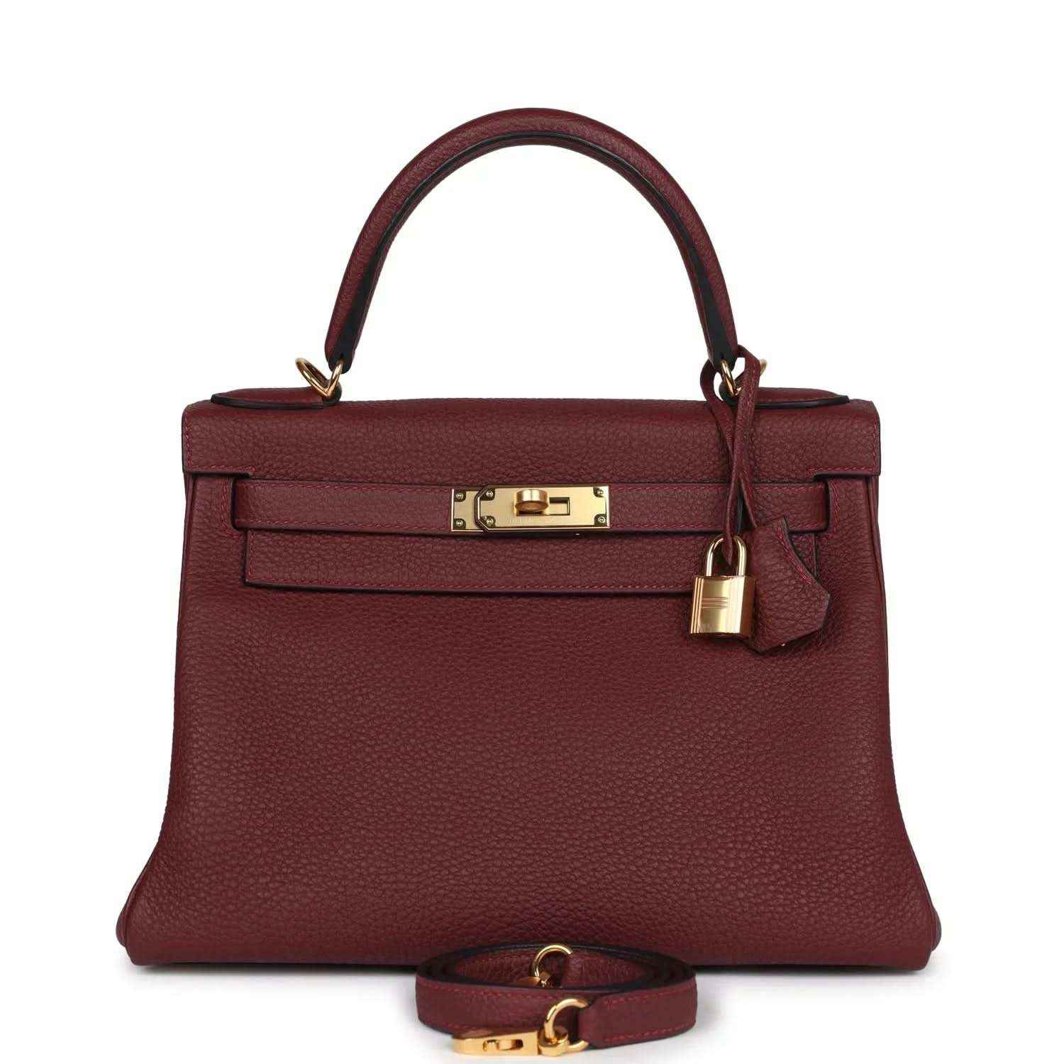 Red leather Hermès Kelly Retourne handbag with gold-tone front lock and top handles