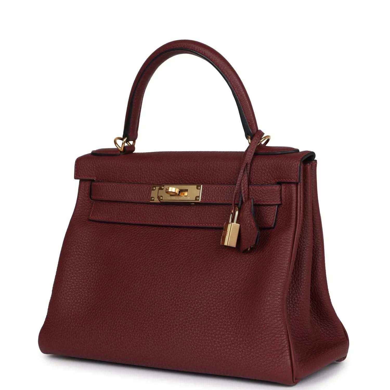 Red leather Hermès Kelly Retourne handbag with gold-tone lock and shoulder strap