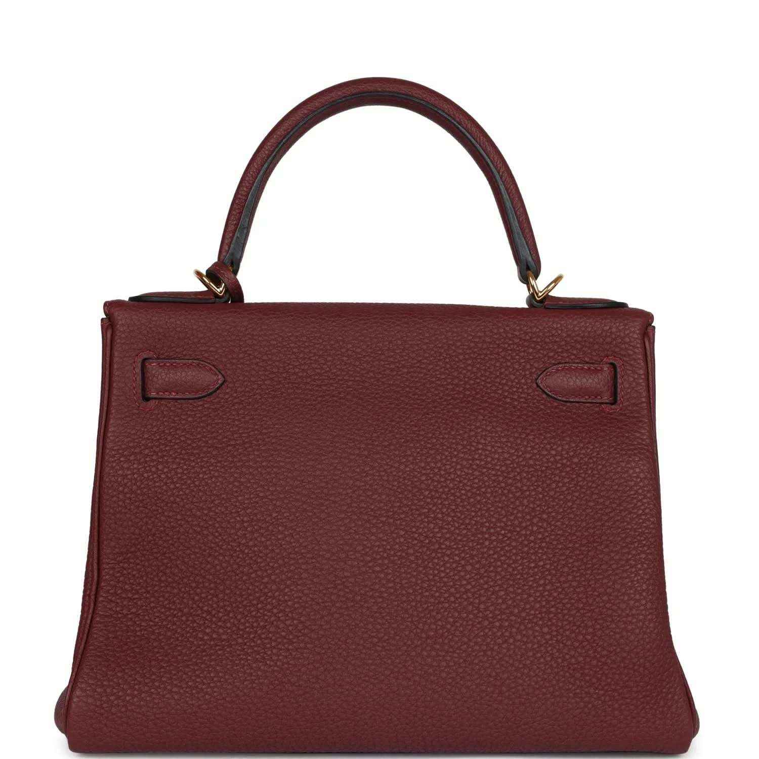 Red leather Hermès Kelly Retourne handbag back view with strap closures