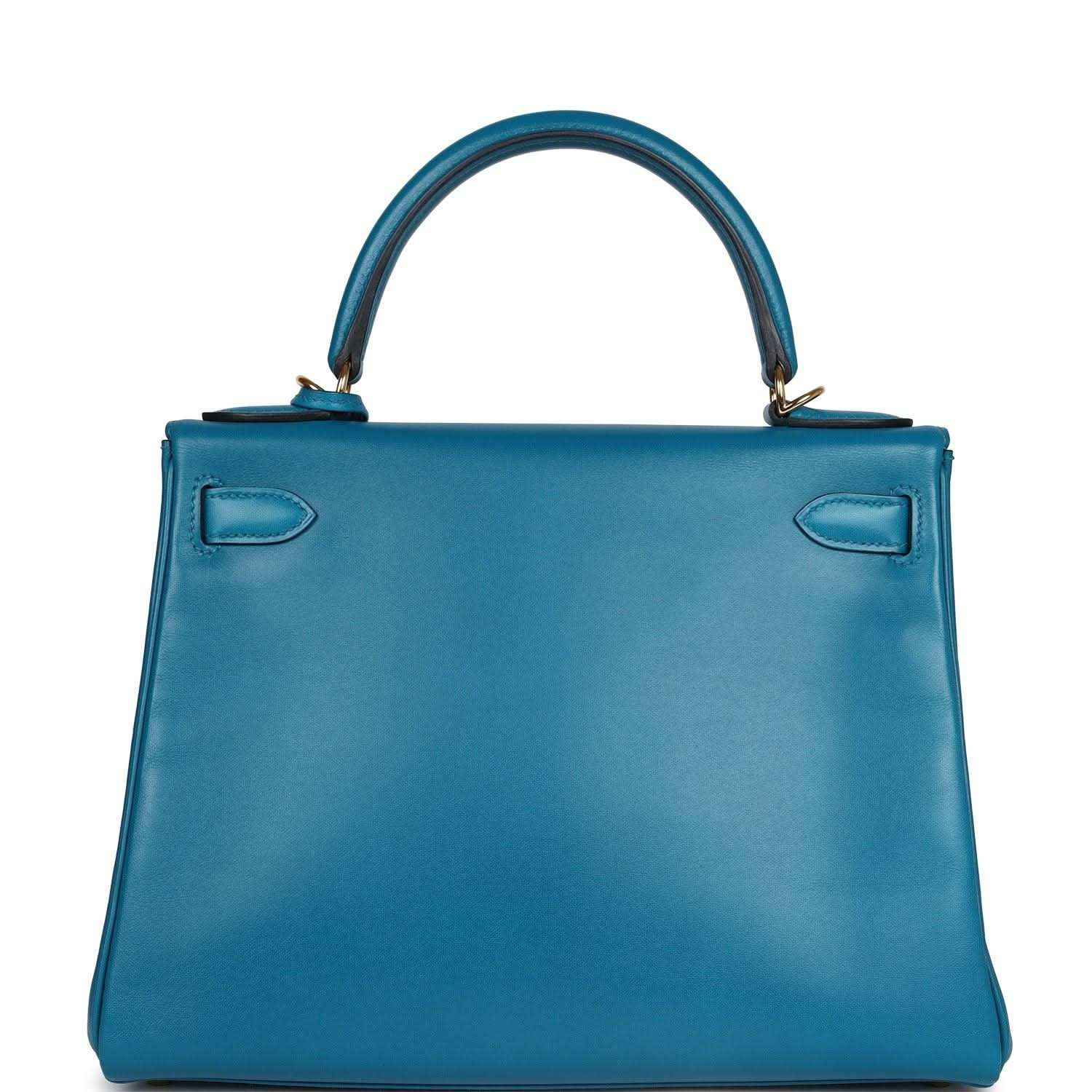 Hermes Kelly Retourne 28 bag in blue leather with back panel and two pull-tab tabs