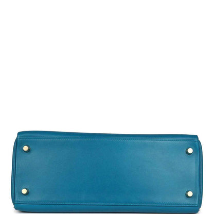 Hermes Kelly Retourne 28 bag base in blue leather with four metal feet