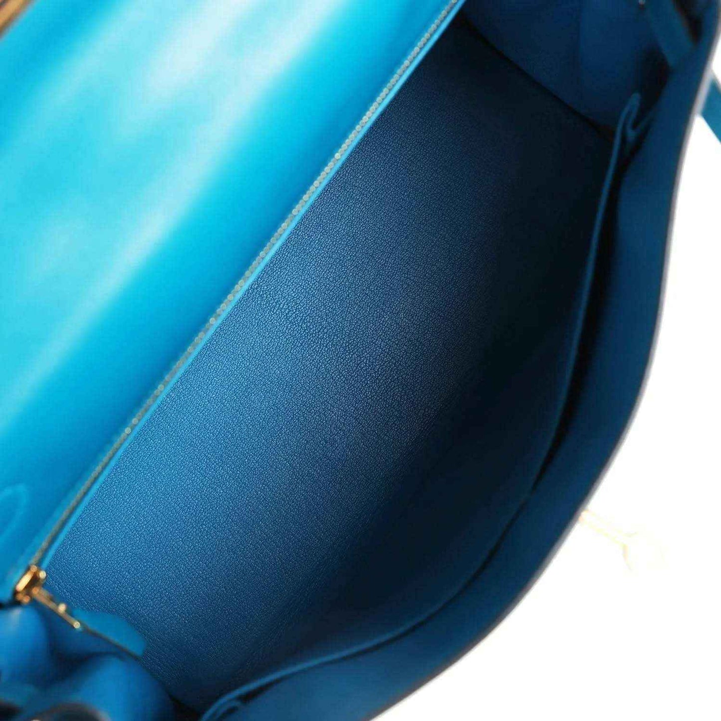 Hermes Kelly Retourne bag interior lining in blue with stitched seam and pocket edge