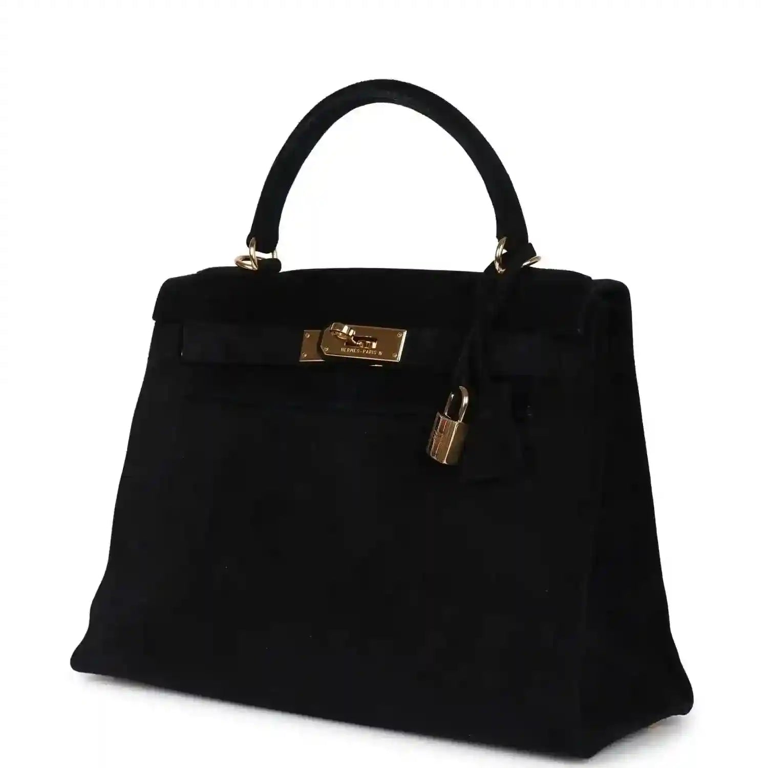 Black suede top-handle handbag with gold front plaque and padlock on side