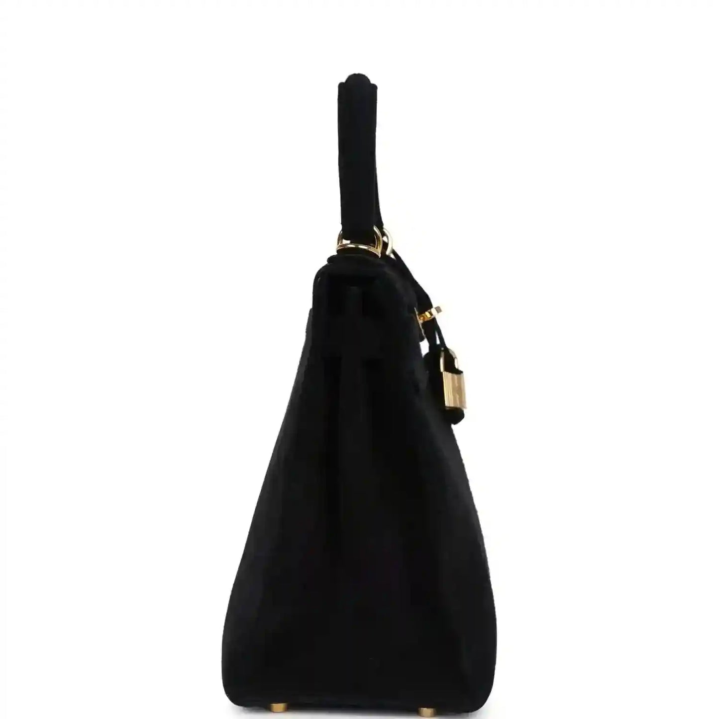 Black suede top-handle handbag standing silhouette with gold strap hardware