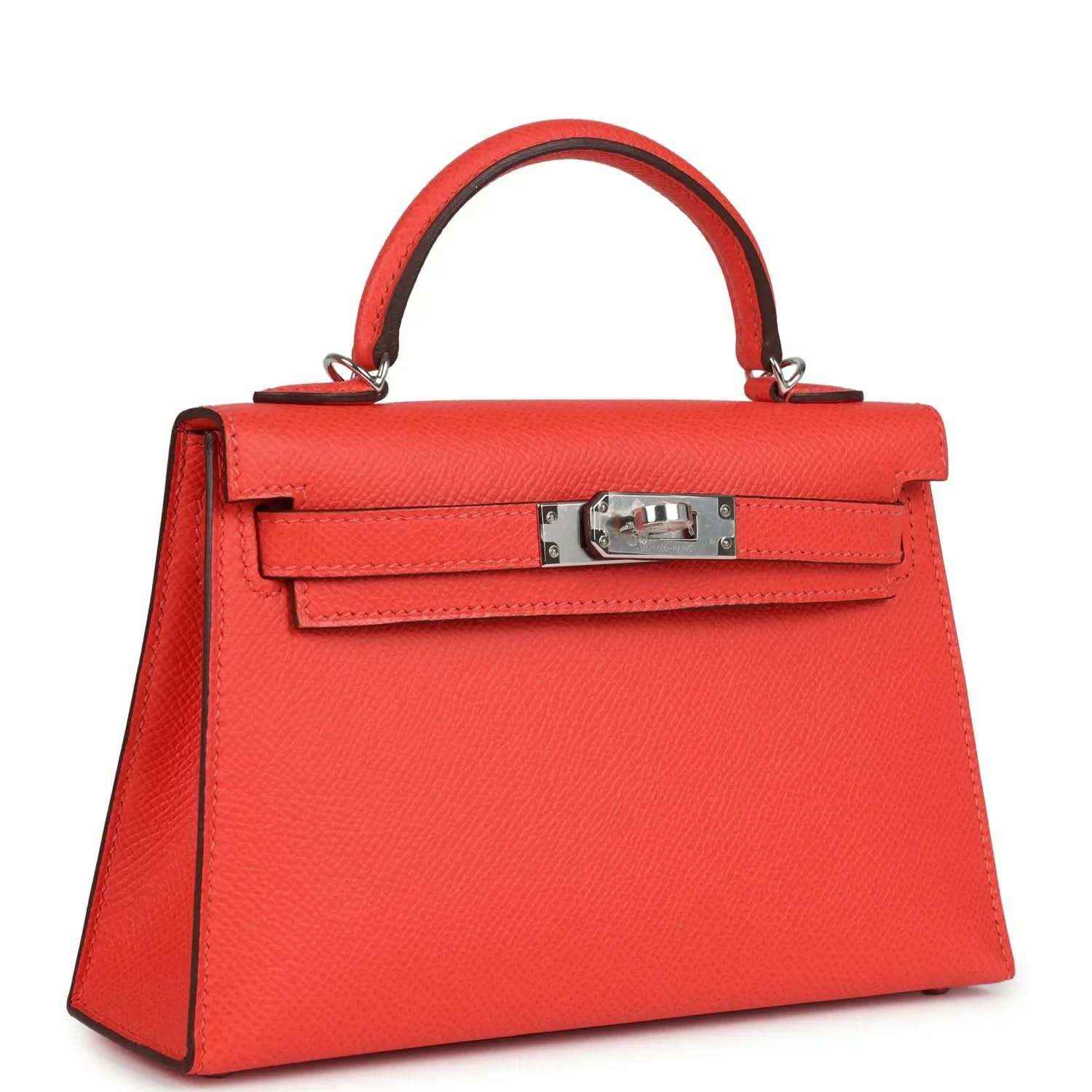 Hermes Kelly Sellier 20 orange-red bag, side view with front flap and metal turn-lock