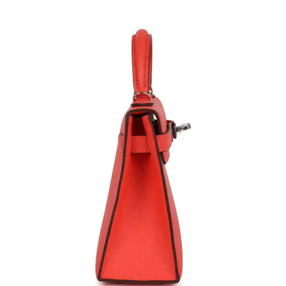 Hermes Kelly Sellier 20 orange-red bag interior view from side, open front flap