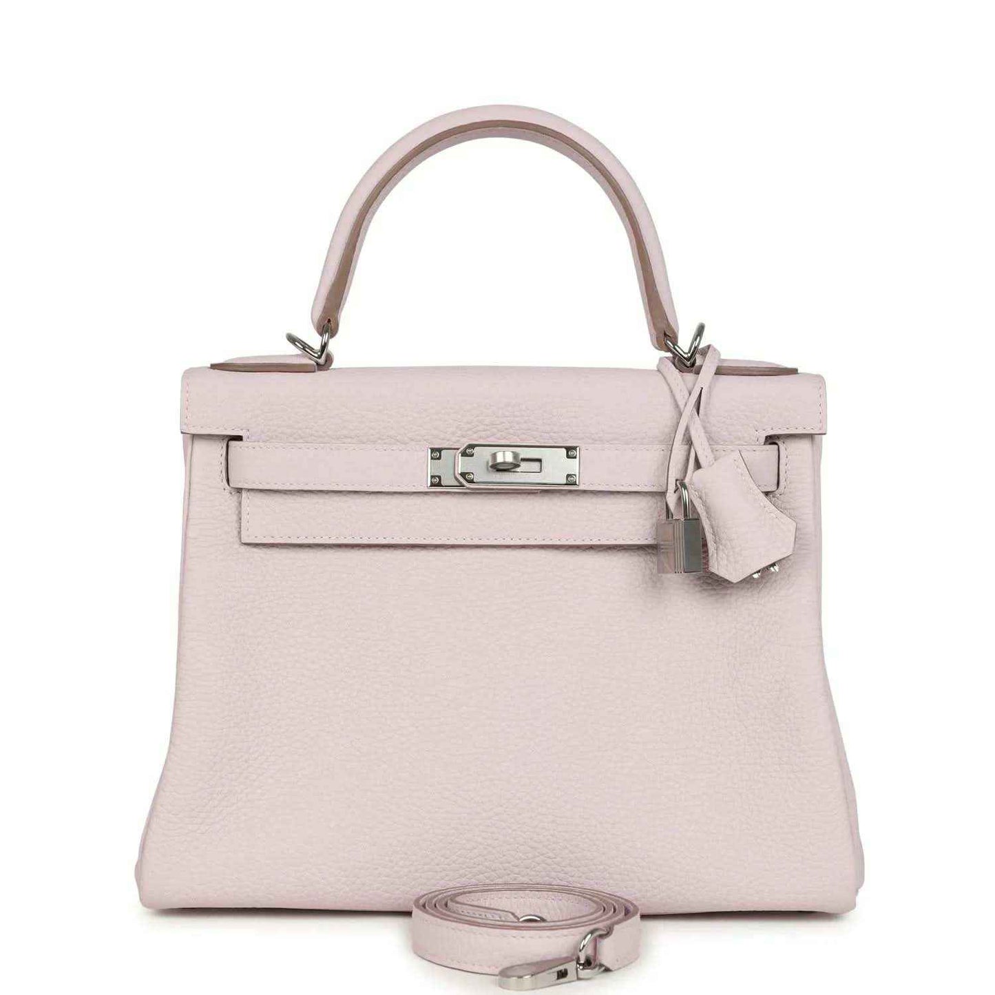 Light mauve leather handbag with top handle, front flap, and silver-tone clasp hardware