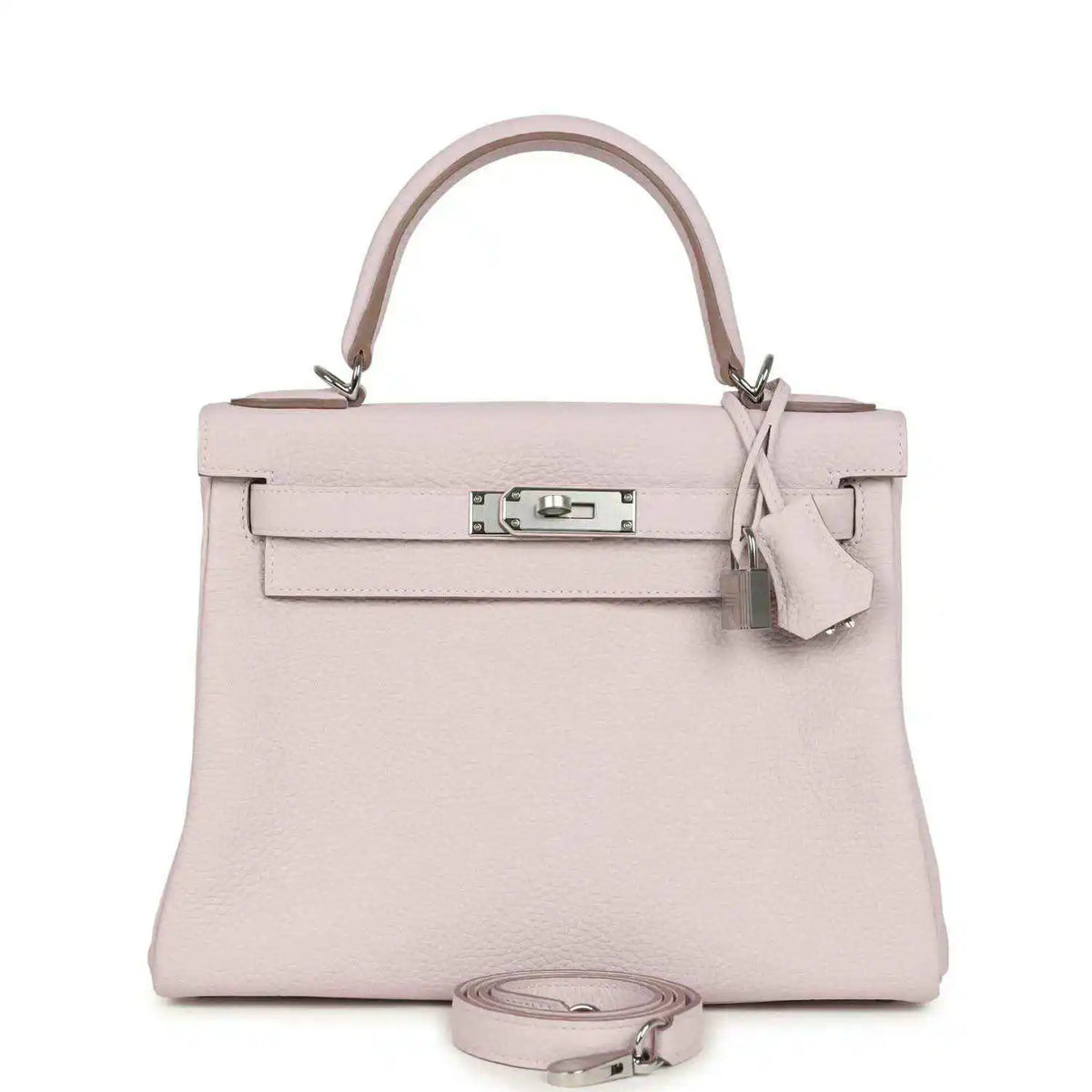 Light mauve leather handbag with top handle, front flap, and silver-tone clasp hardware